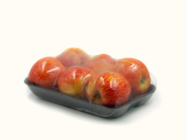 black,peel,with,six,apples,wrapped,in,transparent,plastic,isolated